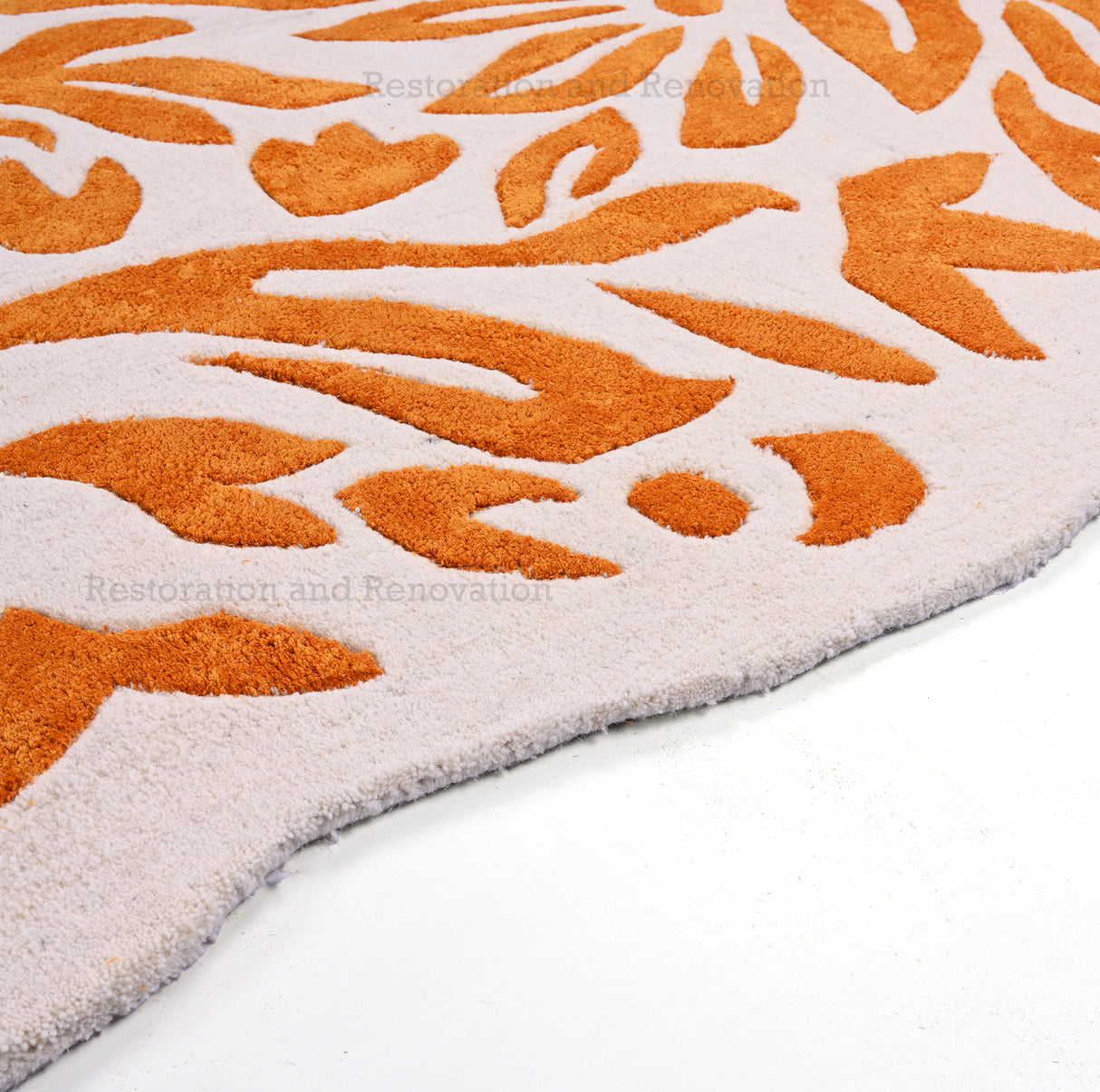 Hand-Tufted Wool Area Rug - Irregular Shape, Vibrant Orange and Cream Floral Design